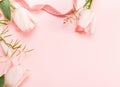 Flowers composition. Frame made of pink flowers on white background. Valentine's Day. Flat lay, top view.