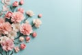 Flowers composition, frame made of pink and white flowers on blue background Royalty Free Stock Photo