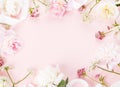 Flowers composition. Frame made of romantic pink peony flowers on pink background. Flat lay, top view Royalty Free Stock Photo