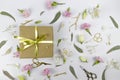 Flowers composition. Gifts and rose flowers on white wooden table. Women Day. Flat lay, top view, copy space Royalty Free Stock Photo