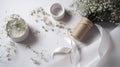 Flowers composition. White gypsophila flowers on white background. Flat lay, top view, copy space.