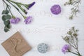 Flowers composition. Workspace with flowers, gift. Top view, flat lay.