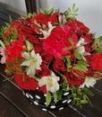 Flowers cute bouquet with roses and alstroemerias pink white green, wooden box