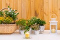 Flowers decorate on the dinning long table in the luxury relax event with the wood plate background Royalty Free Stock Photo