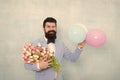 Flowers delivery. Gentleman romantic date. Birthday greetings. Confidence and charisma. Man bearded gentleman suit bow