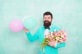 Flowers delivery. Gentleman romantic date. Birthday greetings. Confidence and charisma. Man bearded gentleman suit bow