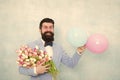 Flowers delivery. Gentleman romantic date. Birthday greetings. For someone special. Man bearded gentleman suit bow tie