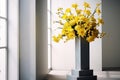 Big bouquet of yellow flowers on pedestal with copy space, room with fresh dahlias