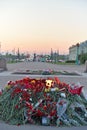 Flowers at the eternal flame at the Champ de Mars at sunset