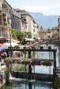 Flowers on a floodgate in old Annecy town in France