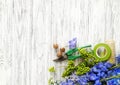 Flowers and florist tools on wooden background. Work in a flower shop