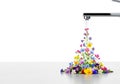 Flowers flowing from a metal faucet. Space for text. Royalty Free Stock Photo