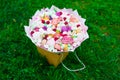 Flowers, fruit bouquet, pink carnation, marshmallows, macaroons, nature Royalty Free Stock Photo