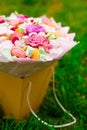 Flowers, fruit bouquet, pink carnation, marshmallows, macaroons, nature Royalty Free Stock Photo