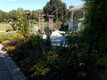 Flowers in garden with lattice and gazebo