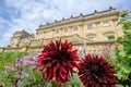 Flowers in the gardens of Harewood House Harrogate Stately Home visible in the background in West Yorkshire near Leeds
