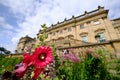 Flowers in the gardens of Harewood House Harrogate Stately Home visible in the background in West Yorkshire near Leeds