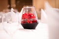 Flowers in glass jars for dining table decorations Royalty Free Stock Photo