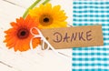 Flowers and greeting card with german word, Danke, means thank you Royalty Free Stock Photo