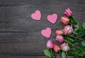 Flowers and hearts on a wooden background Royalty Free Stock Photo