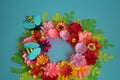 Flowers and insects made from paper on a blue background.Tropical flowers and a butterfly. Royalty Free Stock Photo