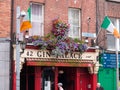 Flowers and Irish flags outside Irish pub in Dublin Royalty Free Stock Photo