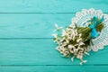 Flowers and lace ribbon on blue wooden background Royalty Free Stock Photo