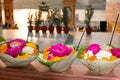 Flowers in leaves ready for a puja at the temple at the river Ganges