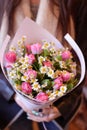 Flowers on a leg in the interior of the restaurant for a celebration shop floristry or wedding