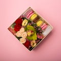 Flowers and macaroons in a hat-box Royalty Free Stock Photo