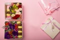 Flowers and macaroons in a hat-box Royalty Free Stock Photo