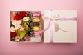 Flowers and macaroons in a hat-box Royalty Free Stock Photo