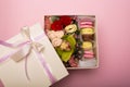 Flowers and macaroons in a hat-box Royalty Free Stock Photo