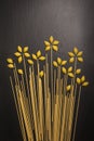 Flowers made out of variety of pasta, isolated on black