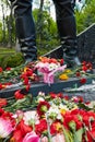 Flowers near the feet of unknown soldier monument. Royalty Free Stock Photo