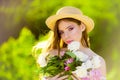 Flowers. Natural beauty spa therapy. Summer girl with long hair. face and skincare. Travel in summer. Spring woman Royalty Free Stock Photo