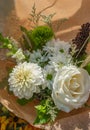 Flowers are near a flower shop on a city street. Beautiful bouquets of various flowers are presented in a flower shop Royalty Free Stock Photo