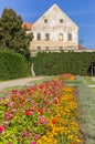 Flowers and old house in Jaromerice nad Rokytnou