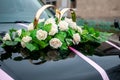 Flowers and pair of yellow wedding rings accessories