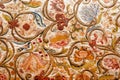 Flowers and patterns on painted textile from Sicily. Design of silk carpet from 17th century. Italian vintage Royalty Free Stock Photo