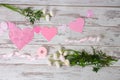 Flowers, pink ribbons, paper valentines