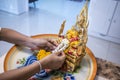 Flowers placed on a Buddha image