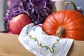 Flowers and pumpkin for autumn home decor. Beautiful composition