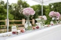 Flowers settings decoration outdoor setup for wedding with pink colored flower Royalty Free Stock Photo