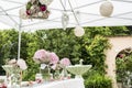 Flowers settings decoration outdoor setup for wedding with pink colored flower Royalty Free Stock Photo