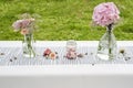 Flowers settings decoration outdoor setup for wedding with pink colored flower Royalty Free Stock Photo