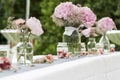 Flowers settings decoration outdoor setup for wedding with pink colored flower Royalty Free Stock Photo