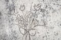 Flowers sketched on sand background