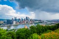 Flowers and stormy view of the Pittsburgh skyline, from Mount Washington, Pittsburgh, Pennsylvania