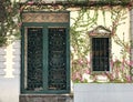 Flowers surround doors and windows